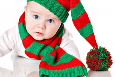 Baby with Christmas hat and scarf